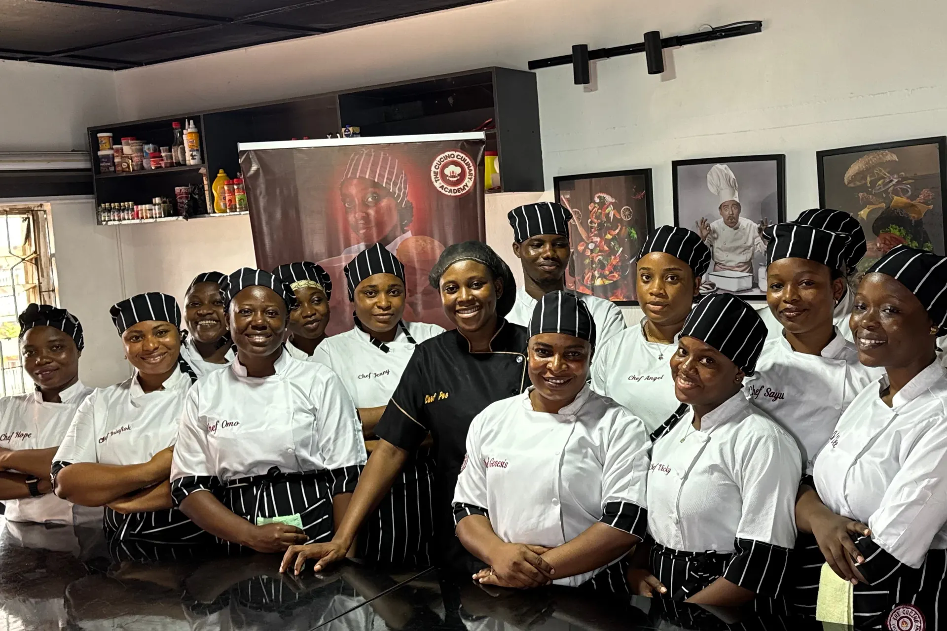 Professional chef cooking with flames in a culinary kitchen